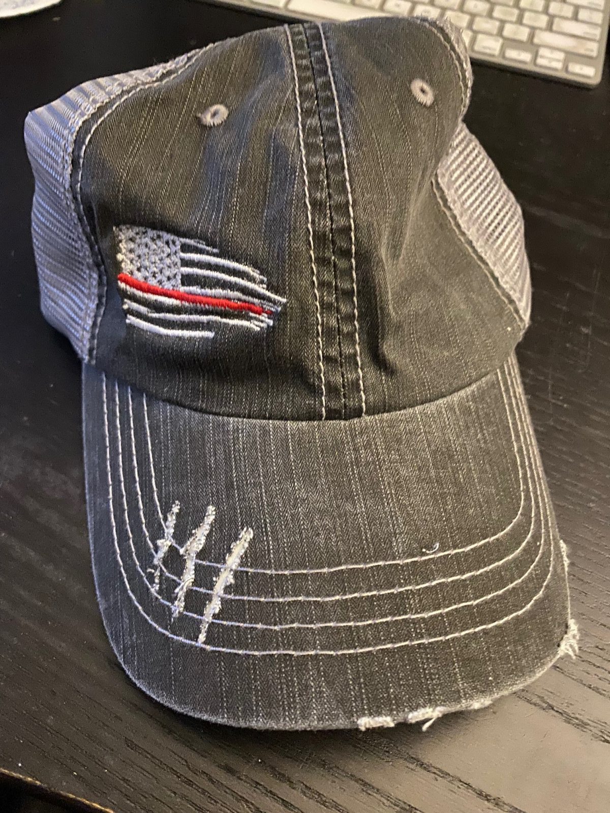 DISTRESSED TRUCKER BLUE OR RED LINE FLAG HAT